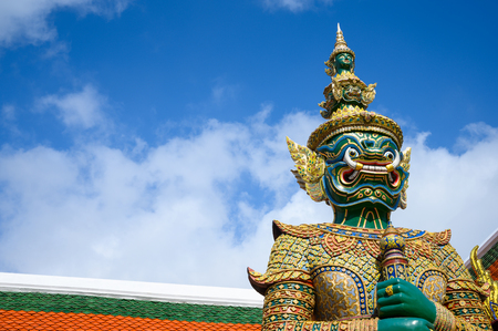 Giant statue in Wat Phra Keaw, Royal Grand Palace in Bangkok Thailand.