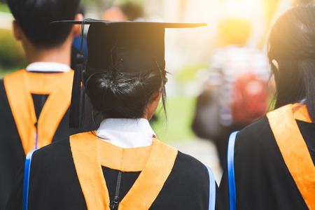 Education theme concept. Back view of Graduates during commencement.の写真素材