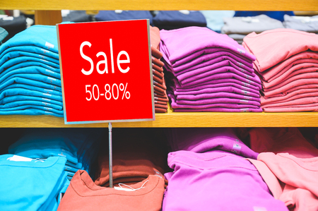 Sale 50-80% off mock up advertise display at clothes line in the shopping department store. Shopping concept.の写真素材