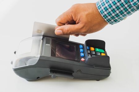 Hand man with credit card machine.