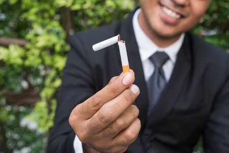 Winning with addicted nicotine problems, stop smoking. Quitting from addiction concept.の写真素材