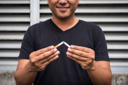 Winning with addicted nicotine problems, stop smoking. Quitting from addiction concept.の写真素材