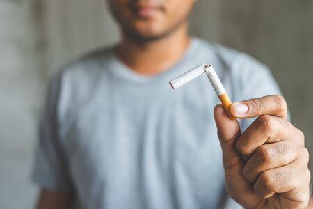 Winning with addicted nicotine problems, stop smoking. Quitting from addiction concept.の写真素材