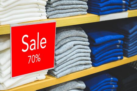 Sale mock up advertise display at clothes line.