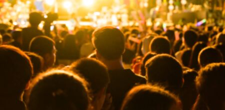 Abstract blurred background of Music concert any people. Crowd attending a concert.の写真素材