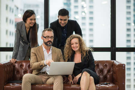 Business people team colleagues in modern office. Man and woman meeting conference and presentation...