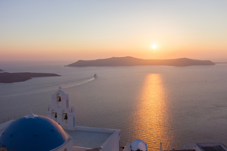 church sunset in santoriniの写真素材