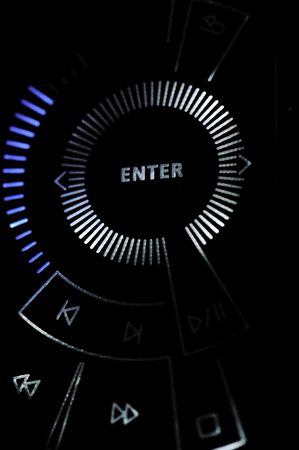 Finger touch sensitive control panel on dark background