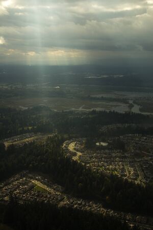 A sunbeam shining down on a new housing development in Washingtonのeditorial素材