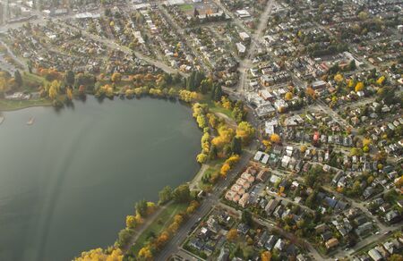 Small lake in urban area at sunsetの写真素材