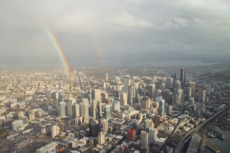 Two rainbows forming over downtown Seattleのeditorial素材