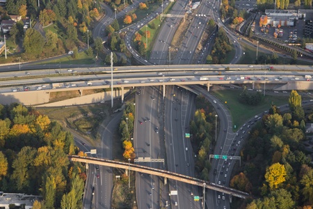 Aerial view of a complex interchange at sunsetの写真素材
