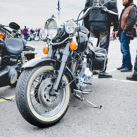 Carrickfergus, County Antrim â April 17 2011: An illustrative editorial image depicting a highly polished, chrome plated, Harley-Davidson motorcycle parked up on its stand.のeditorial素材