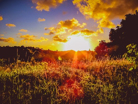 Colorful sunbeams at duskの写真素材