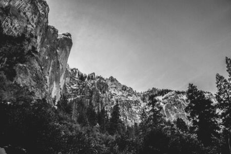 looking up at dramatic black and white cliffsの写真素材