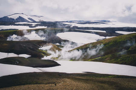 Misty volcanic snow mountain range
