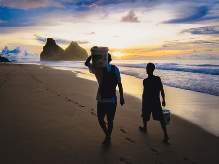 working on the beachの写真素材