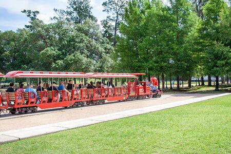 May 2017, Houston, Texas:  People ride the Hermann Park trainのeditorial素材