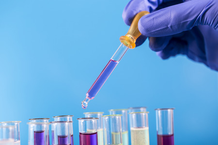 Workplace modern laboratory for molecular biology test on blue 