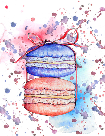 Pink and blue macarons tied with red ribbonの写真素材