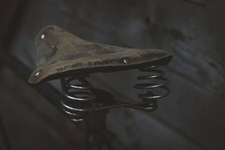 Old leather bicycleの写真素材