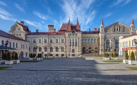 Historic Exchange in Rybinsk with Red Merchant Court on right, featuring a recreated vintage signの写真素材