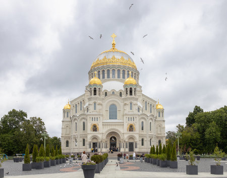 Kronstadt, Russia â 06.30.2025: Naval Cathedral with golden domes and seagullsの写真素材