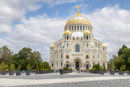 Kronstadt, Russia 06.30.2025 - Naval Cathedral in Kronstadt, Russia, with golden domes under cloudy skyの写真素材