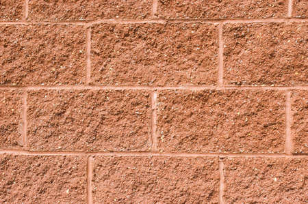 Red brick background in full sunlightの写真素材