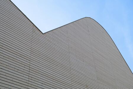 wooden facade modern perspective whit sky backgroundの写真素材