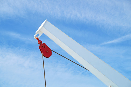 Pulley block. Detail of crane on passenger cruise tall ship sailing .の写真素材