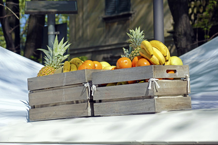 fresh fruits and berries in wooden box,の写真素材