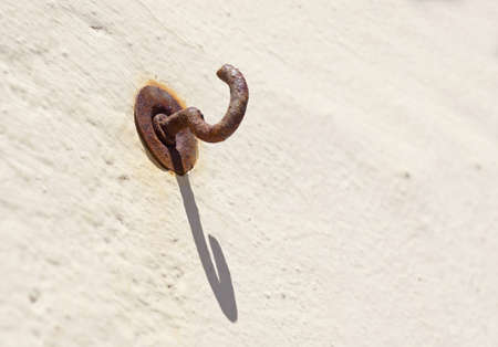 rusted hook on the wallの写真素材