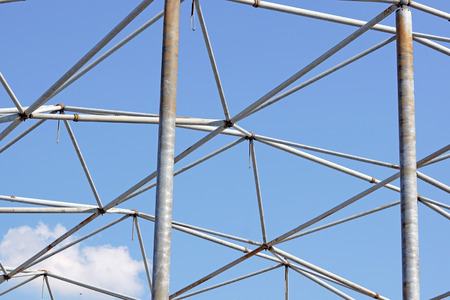 metal structure with blue sky background
