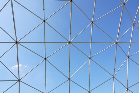 metal structure with blue sky backgroundの写真素材