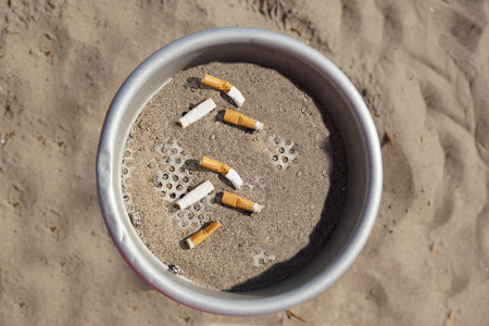 ashtrays at the beachの写真素材