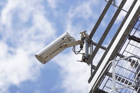 security cctv cameras  with blue sky backgroundの写真素材