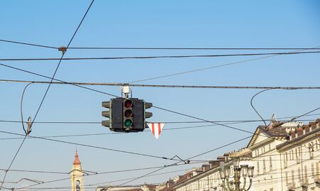 Red and green traffic lights against blue sky backgroundsの写真素材