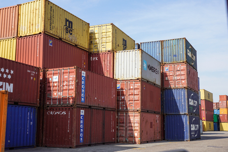 MILAN , ITALY 10 April 2017 : Several containers are ready to be loaded on to ships at the port....