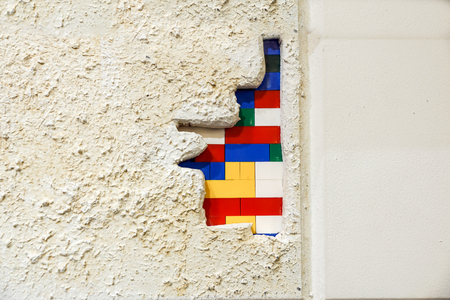 colored cubes inside the wall concrete detailの写真素材