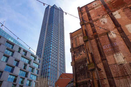 LONDON, ENGLAND - APRIL 25: south bank tower london .Low tide on building with its community of design boutiques, studios, galleries and restaurants located on the south bank in central London.のeditorial素材