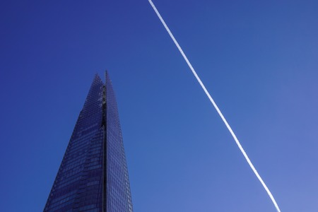 LONDON - APR 20 : The Shard building and riverside pictured on April 20th, 2013, in London. The Shard opened to the public on February 2013. Standing 309m, the Shard is the tallest building in Europe.のeditorial素材