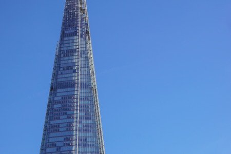 LONDON - APR 20 : The Shard building and riverside pictured on April 20th, 2013, in London. The Shard opened to the public on February 2013. Standing 309m, the Shard is the tallest building in Europe.のeditorial素材