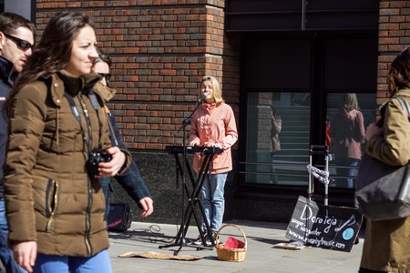 LONDON, UK - APRIL 22, 2017: Shoreditch, London: street musicians at Columbia Road flower marketのeditorial素材