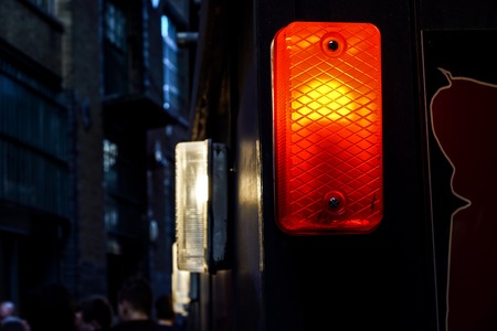 detail of a red traffic warning lamp .の写真素材