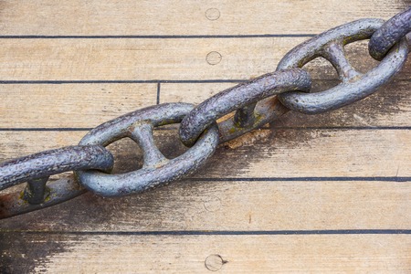 Ships anchor chain on the floor on the boat .の写真素材