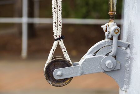 the pulley for pulling the flag on the pole .の写真素材