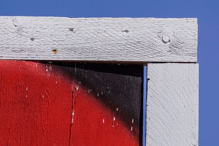 Vertical wooden fence boards and blue sky .の写真素材