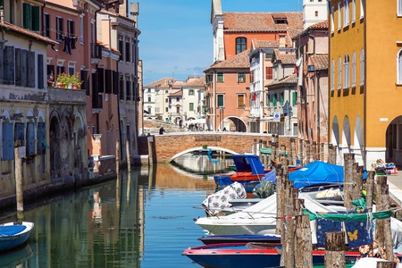 Venice, Italy - 7 july ,2017 : View of the house characteristics of the lagoon of Venice in italy along the canals with moored boats. Venice is the city on the seaのeditorial素材