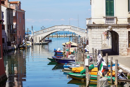 Venice, Italy - 7 july ,2017 : View of the house characteristics of the lagoon of Venice in italy along the canals with moored boats. Venice is the city on the seaのeditorial素材